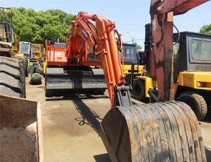 колесный экскаватор Doosan DH 140W-7